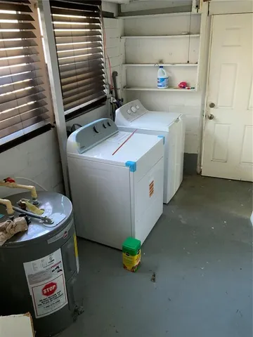 a utility room with dryer and washer
