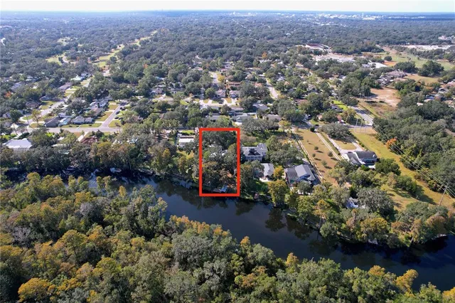 a kitchen with stainless steel appliances granite countertop a stove sink and cabinets