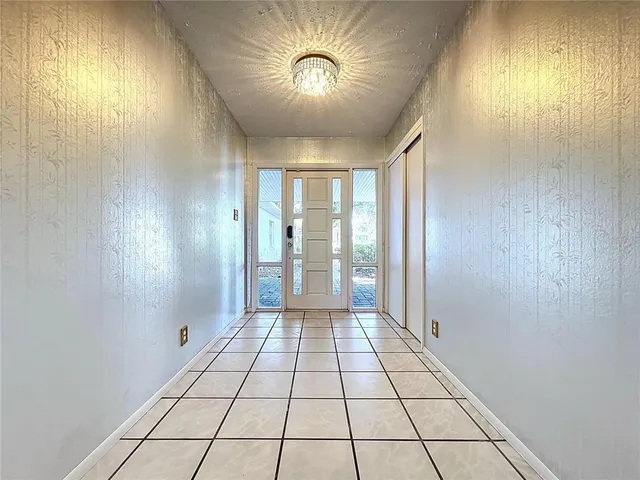 a view of a livingroom with furniture and window