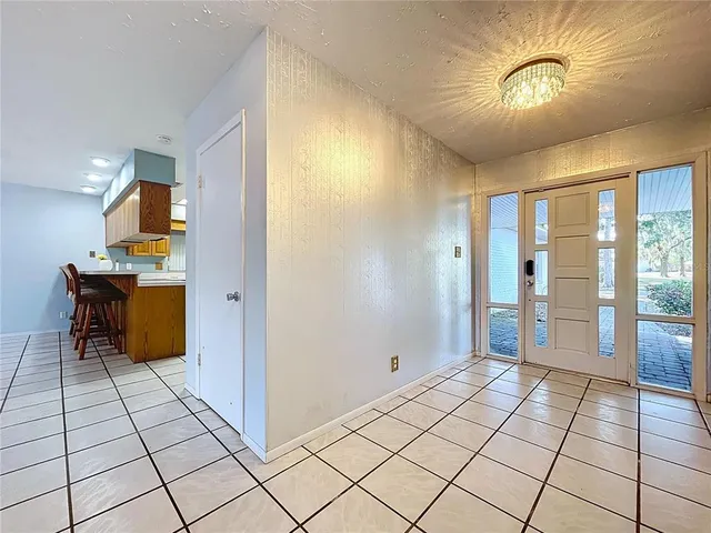 a view of an empty room and window