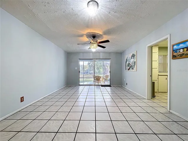 a kitchen with a cabinets and white appliances
