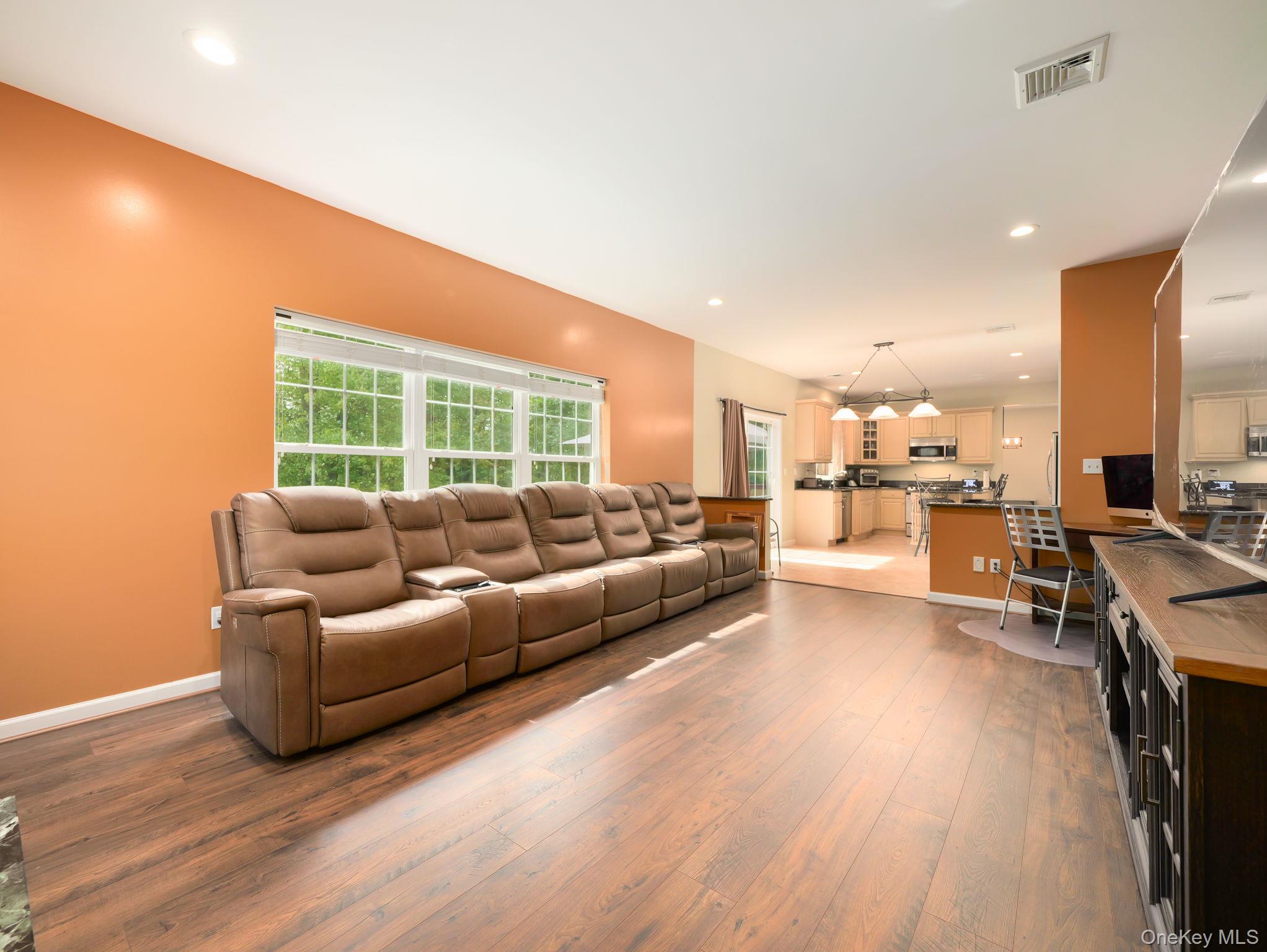 74 Red Maple Way New Windsor, NY 12553 - Photo 4 of 25 Living area with recessed lighting and light wood-type flooring
