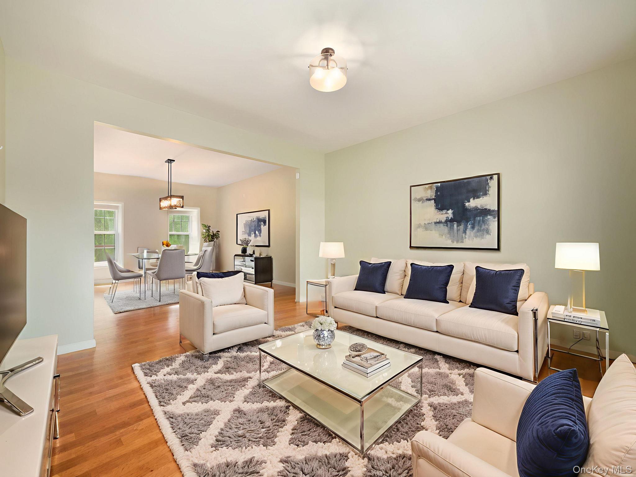 74 Red Maple Way New Windsor, NY 12553 - Photo 8 of 25 Living area with light wood-style flooring and baseboards