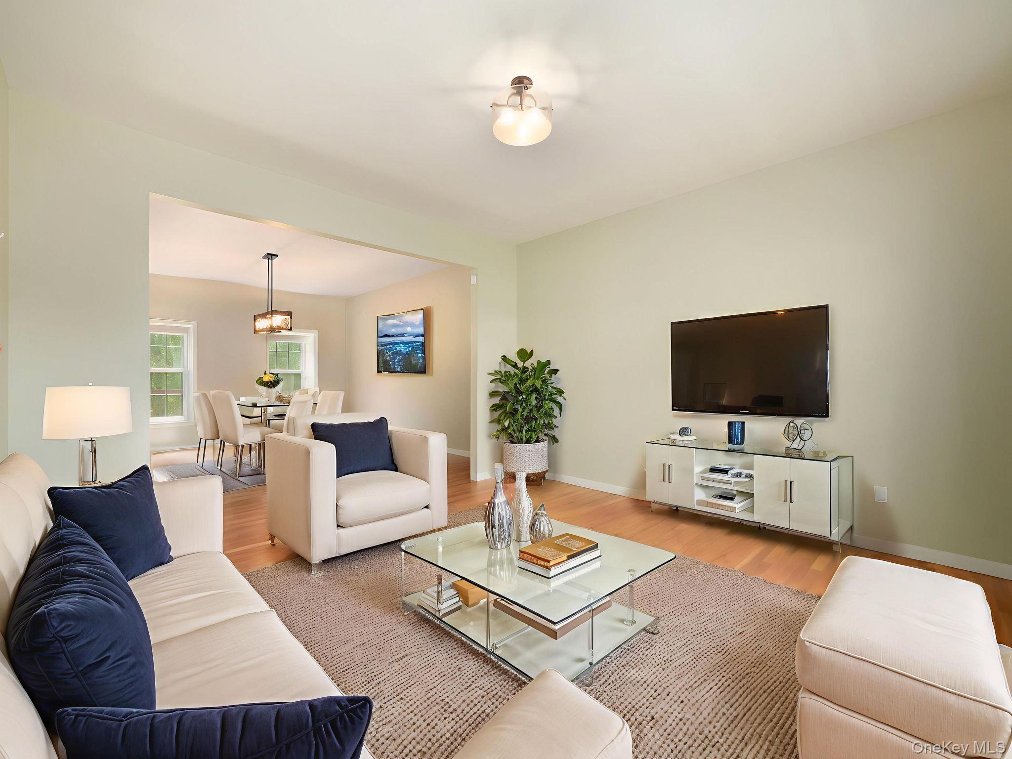 74 Red Maple Way New Windsor, NY 12553 - Photo 9 of 25 Living area with wood finished floors and baseboards