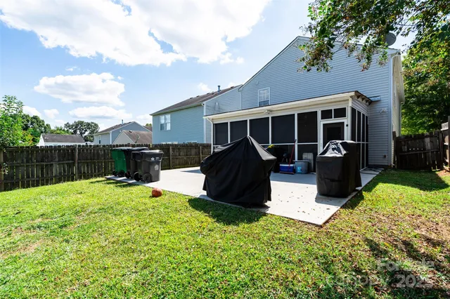 an aerial view of a house with a garden