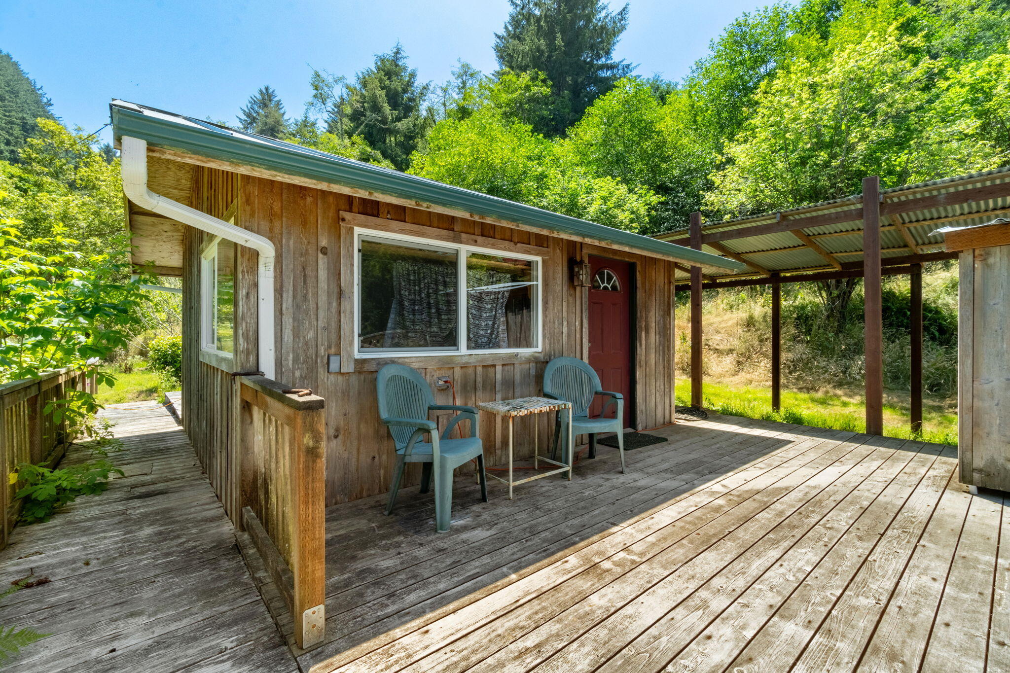 755-763 Oeschger Road Ferndale, CA 95536 - Photo 5 of 36 a view of a house with backyard and porch