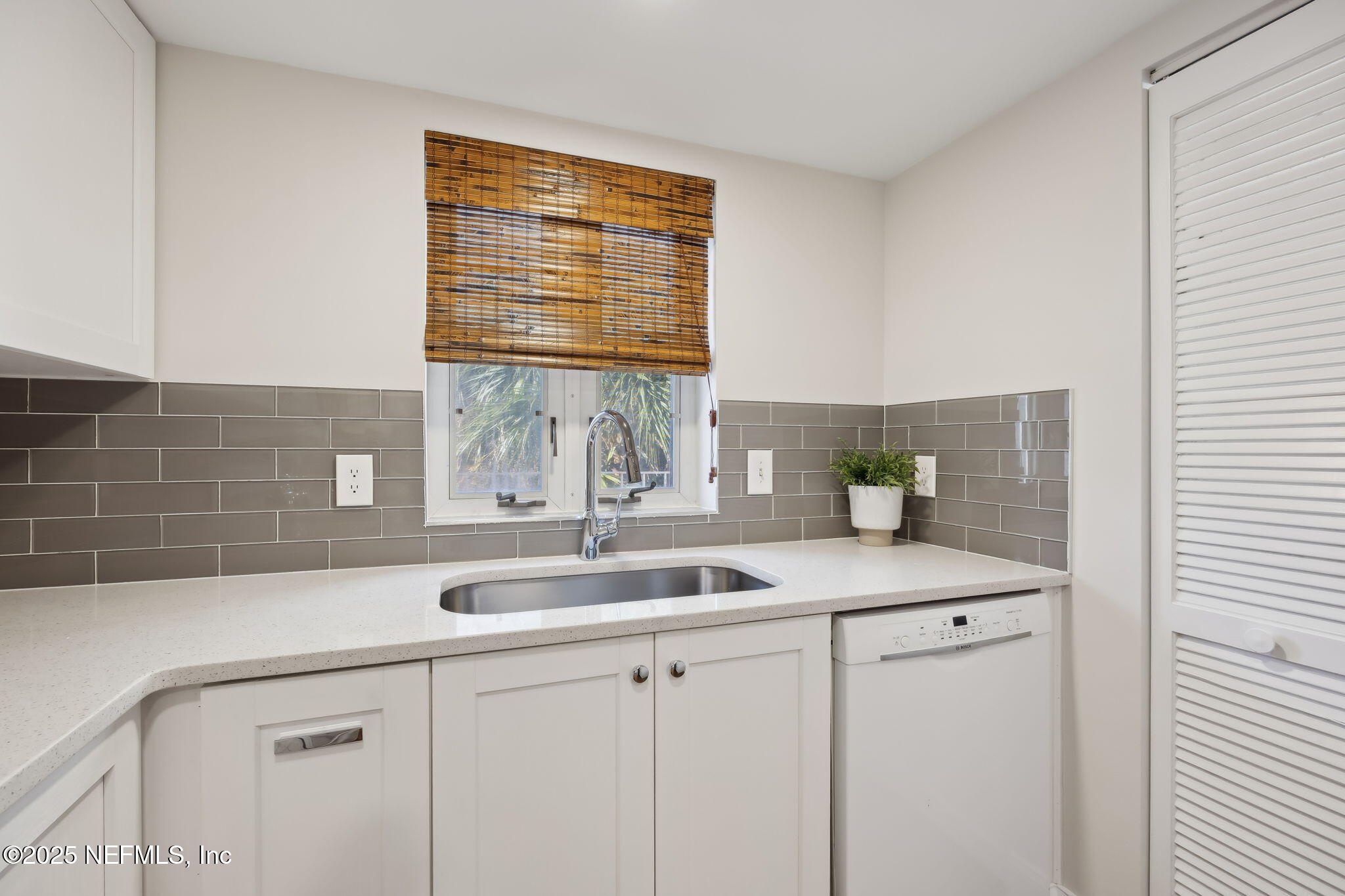 2912 St Johns Avenue, Unit 17 Jacksonville, FL 32205 - Photo 20 of 60 a kitchen with a sink and cabinets