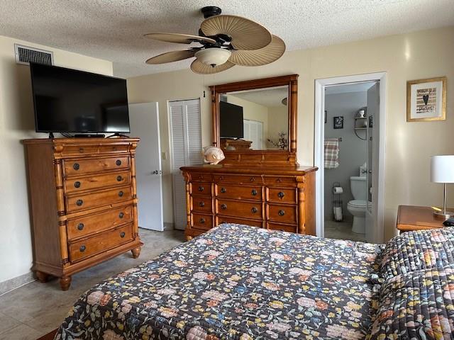 808 Southeast 7th Street, Unit 101B Deerfield Beach, FL 33441 - Photo 13 of 36 a bedroom with a bed and a flat screen tv