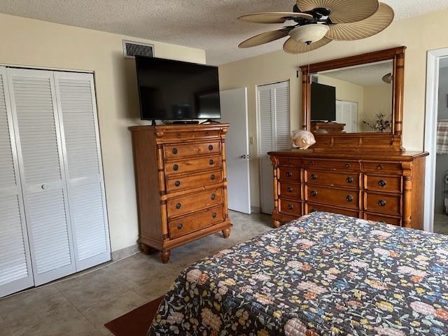 808 Southeast 7th Street, Unit 101B Deerfield Beach, FL 33441 - Photo 18 of 36 a bedroom with a bed and a flat screen television