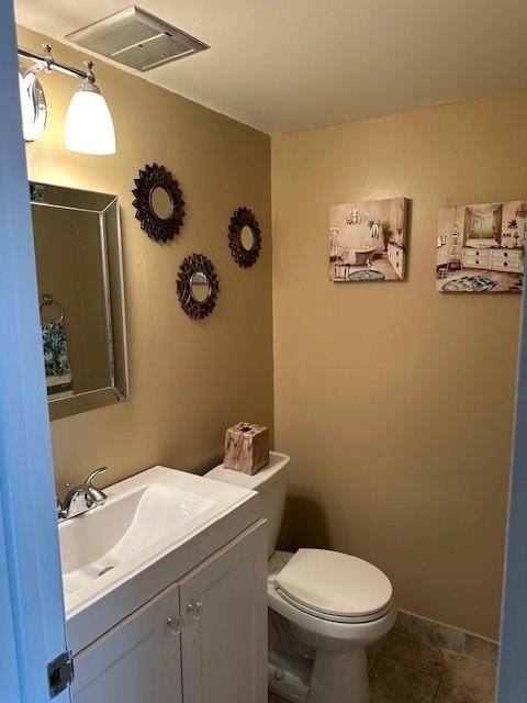 808 Southeast 7th Street, Unit 101B Deerfield Beach, FL 33441 - Photo 21 of 36 a bathroom with a granite countertop sink and toilet