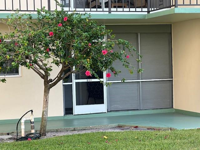 808 Southeast 7th Street, Unit 101B Deerfield Beach, FL 33441 - Photo 27 of 36 a house view with a garden space