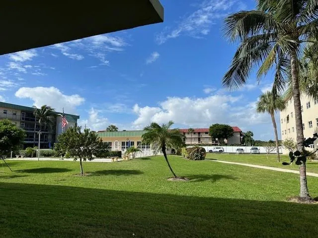 a view of garden with patio