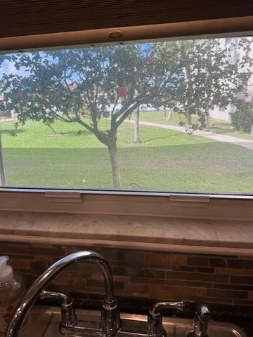 a view of a porch of a house with porch