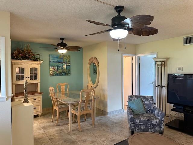 808 Southeast 7th Street, Unit 101B Deerfield Beach, FL 33441 - Photo 4 of 36 a view of a livingroom with furniture and a window