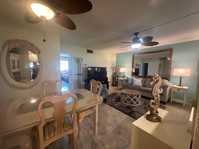808 Southeast 7th Street, Unit 101B Deerfield Beach, FL 33441 - Photo 8 of 36 a living room with furniture and a large mirror
