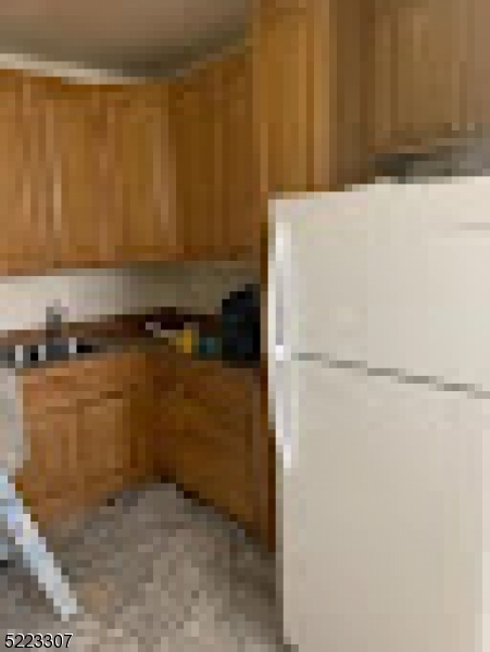200 Central Avenue Hackensack, NJ 07601 - Photo 1 of 4 a view of storage and utility room with washer and dryer