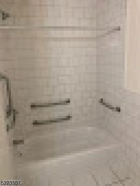 200 Central Avenue Hackensack, NJ 07601 - Photo 2 of 4 a bathroom with a shower