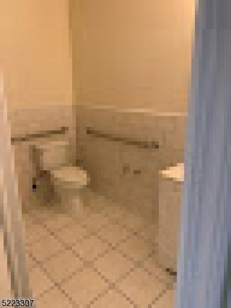 200 Central Avenue Hackensack, NJ 07601 - Photo 3 of 4 a bathroom with a toilet and a shower