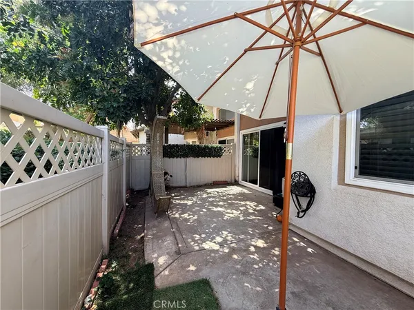 a view of a back yard of the house