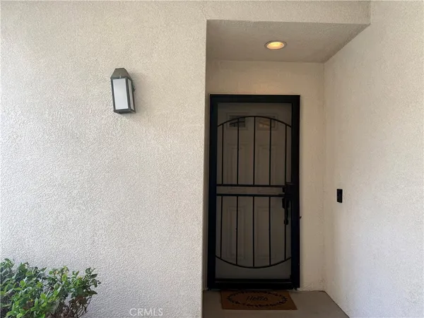 a view of a hallway with entryway
