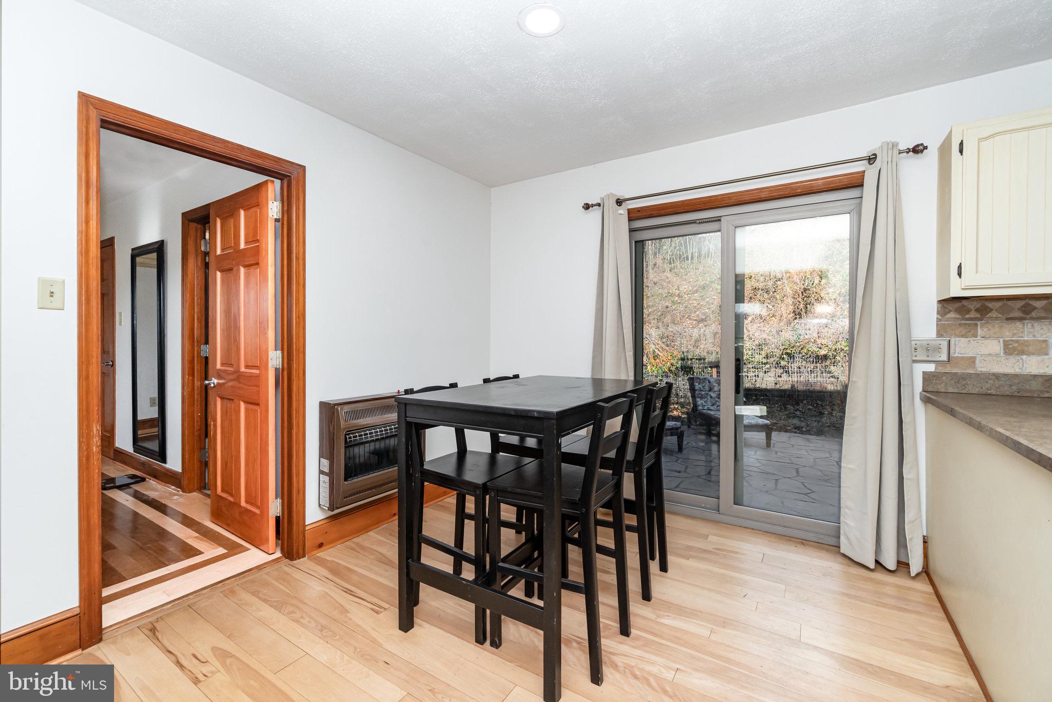 798 Byerland Church Road Willow Street, PA 17584 - Photo 16 of 31 a view of a dining room with furniture window and wooden floor
