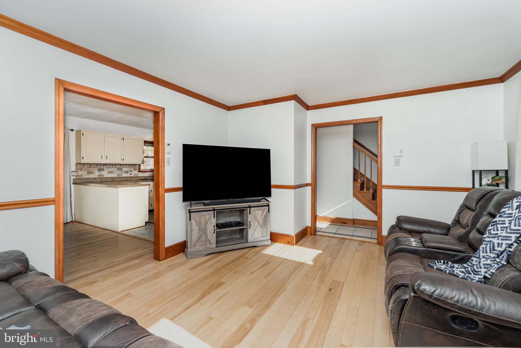 798 Byerland Church Road Willow Street, PA 17584 - Photo 17 of 31 a living room with furniture and a flat screen tv