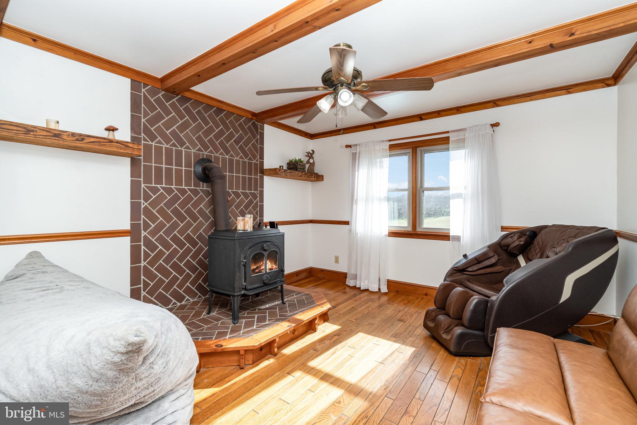 798 Byerland Church Road Willow Street, PA 17584 - Photo 20 of 31 a living room with furniture and a window
