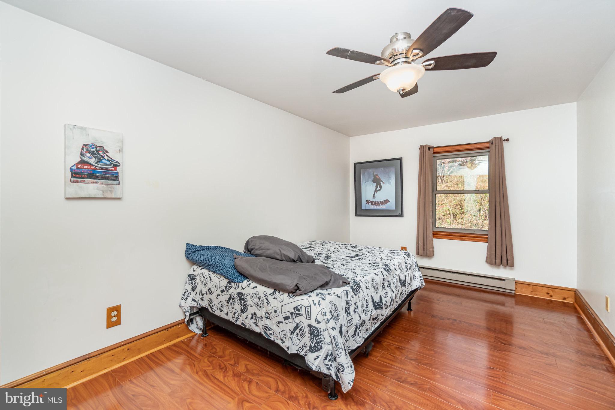 798 Byerland Church Road Willow Street, PA 17584 - Photo 28 of 31 a bedroom with bed and a window