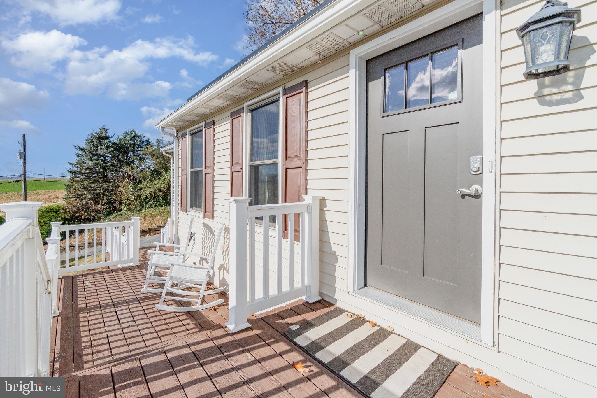 798 Byerland Church Road Willow Street, PA 17584 - Photo 5 of 31 a view of a house with a door and wooden floor