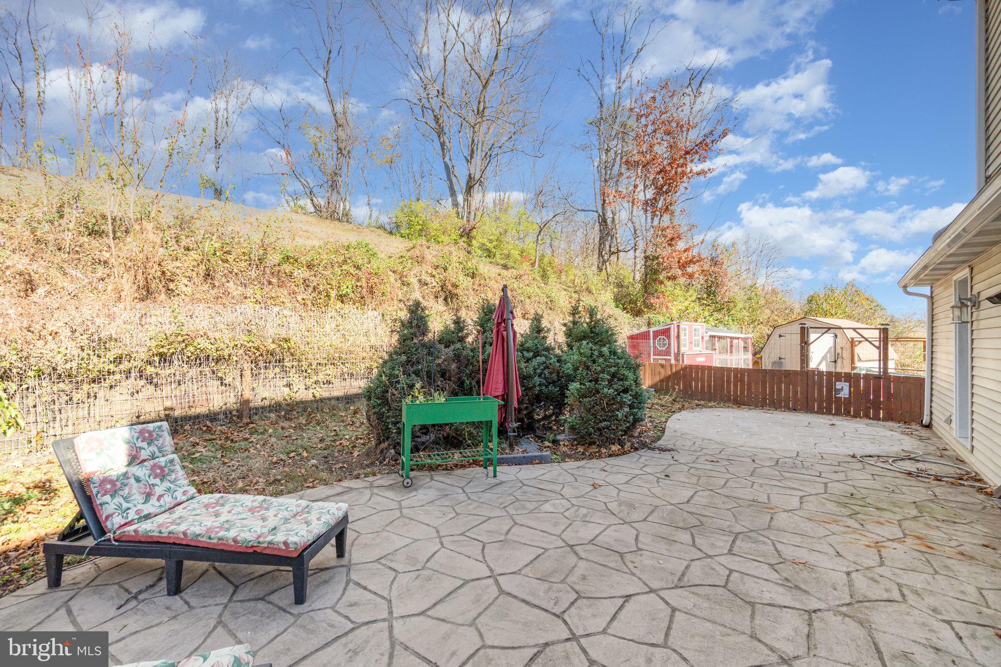 798 Byerland Church Road Willow Street, PA 17584 - Photo 10 of 31 a view of a chair and table in backyard of the house