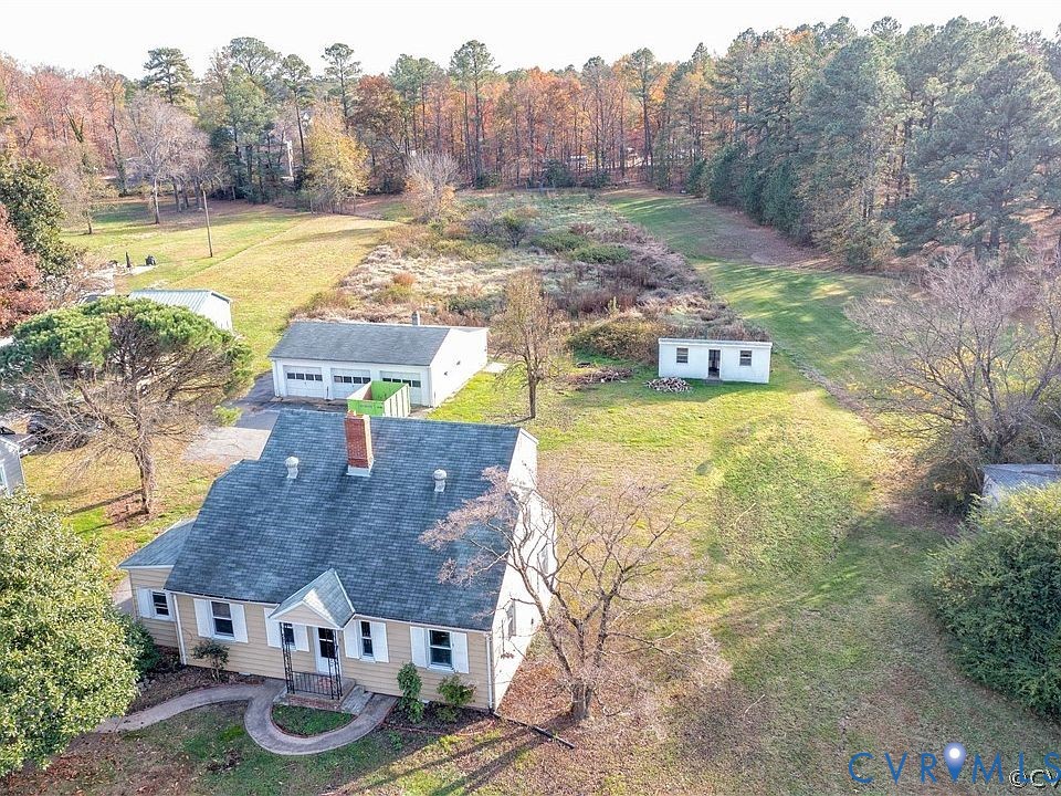2005 Hungary Road Henrico, VA 23228 - Photo 4 of 5 a view of a house with pool and a yard