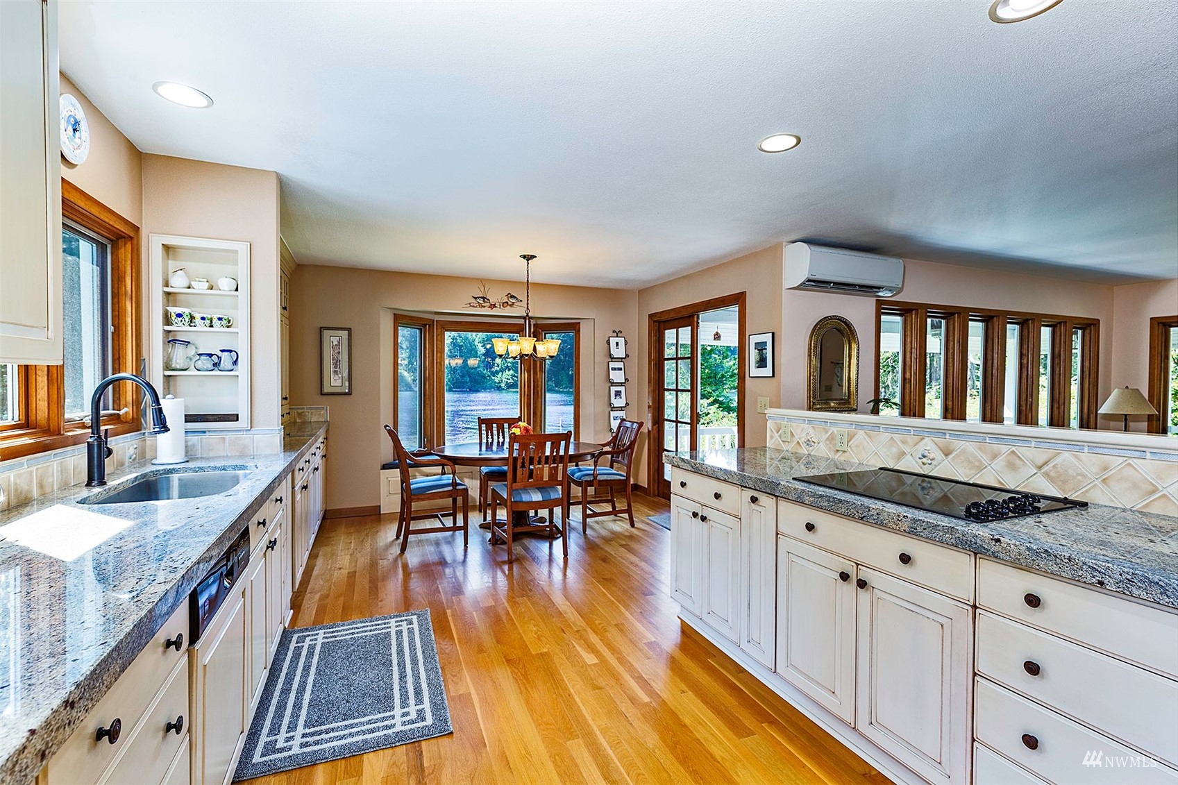 10518 Guthrie Road Anderson Island, WA 98303 - Photo 11 of 40 a living room with stainless steel appliances granite countertop furniture and a kitchen view