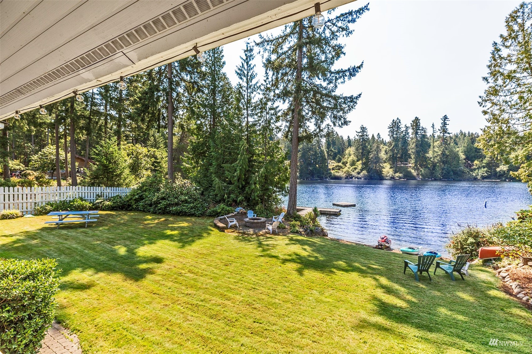 10518 Guthrie Road Anderson Island, WA 98303 - Photo 16 of 40 a view of a swimming pool with a patio
