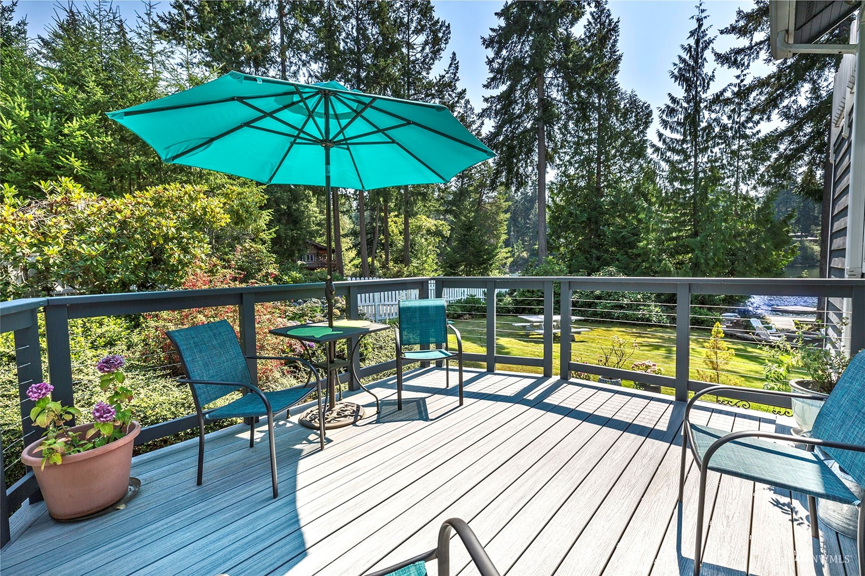 10518 Guthrie Road Anderson Island, WA 98303 - Photo 32 of 40 a view of a chairs and table in the balcony