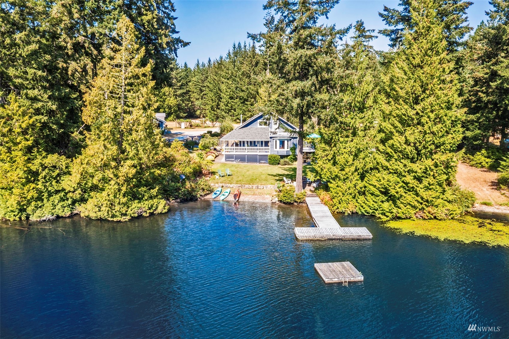 10518 Guthrie Road Anderson Island, WA 98303 - Photo 38 of 40 a swimming pool with trees in the background