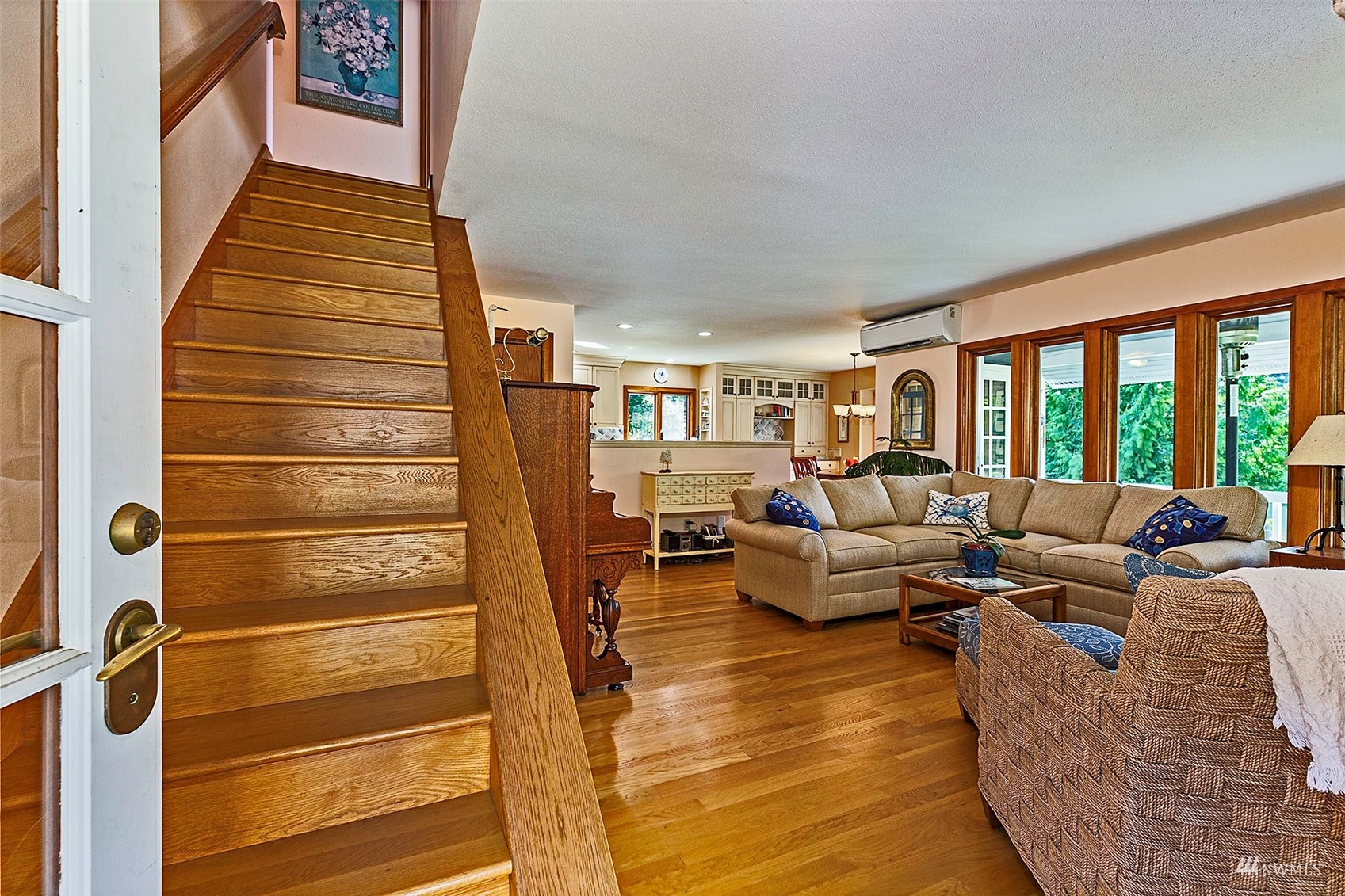 10518 Guthrie Road Anderson Island, WA 98303 - Photo 6 of 40 a living room with furniture and wooden floor