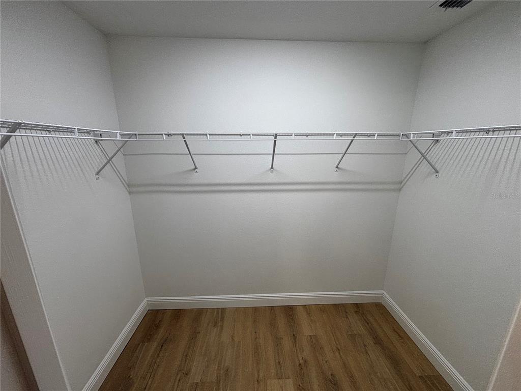 3148 Southwest 145th Court Ocala, FL 34481 - Photo 13 of 17 a view of a room with racks on the wall