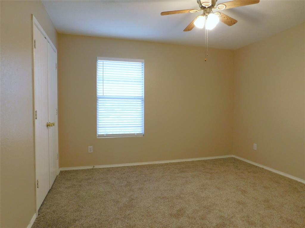 8105 Winding Stream Lane Denton, TX 76210 - Photo 16 of 28 an empty room with a window