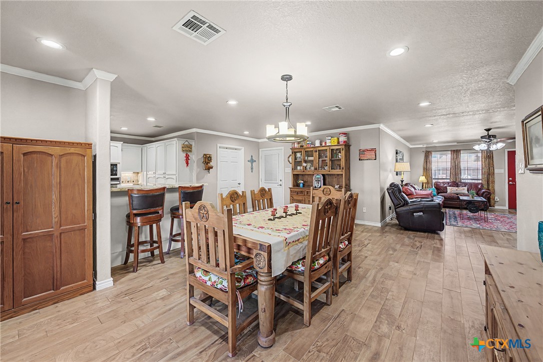 1601 Sunset Circle Cameron, TX 76520 - Photo 14 of 40 a large kitchen with a table and chairs