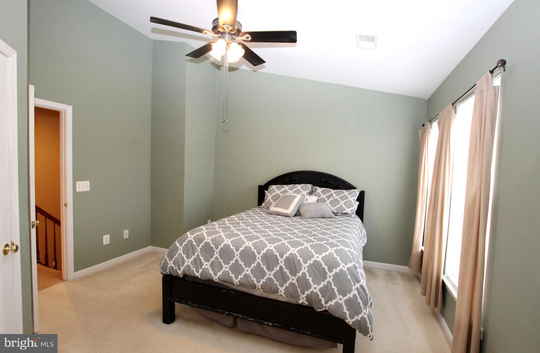 1315 Steed Street Ranson, WV 25438 - Photo 22 of 30 a bedroom with a bed and a window