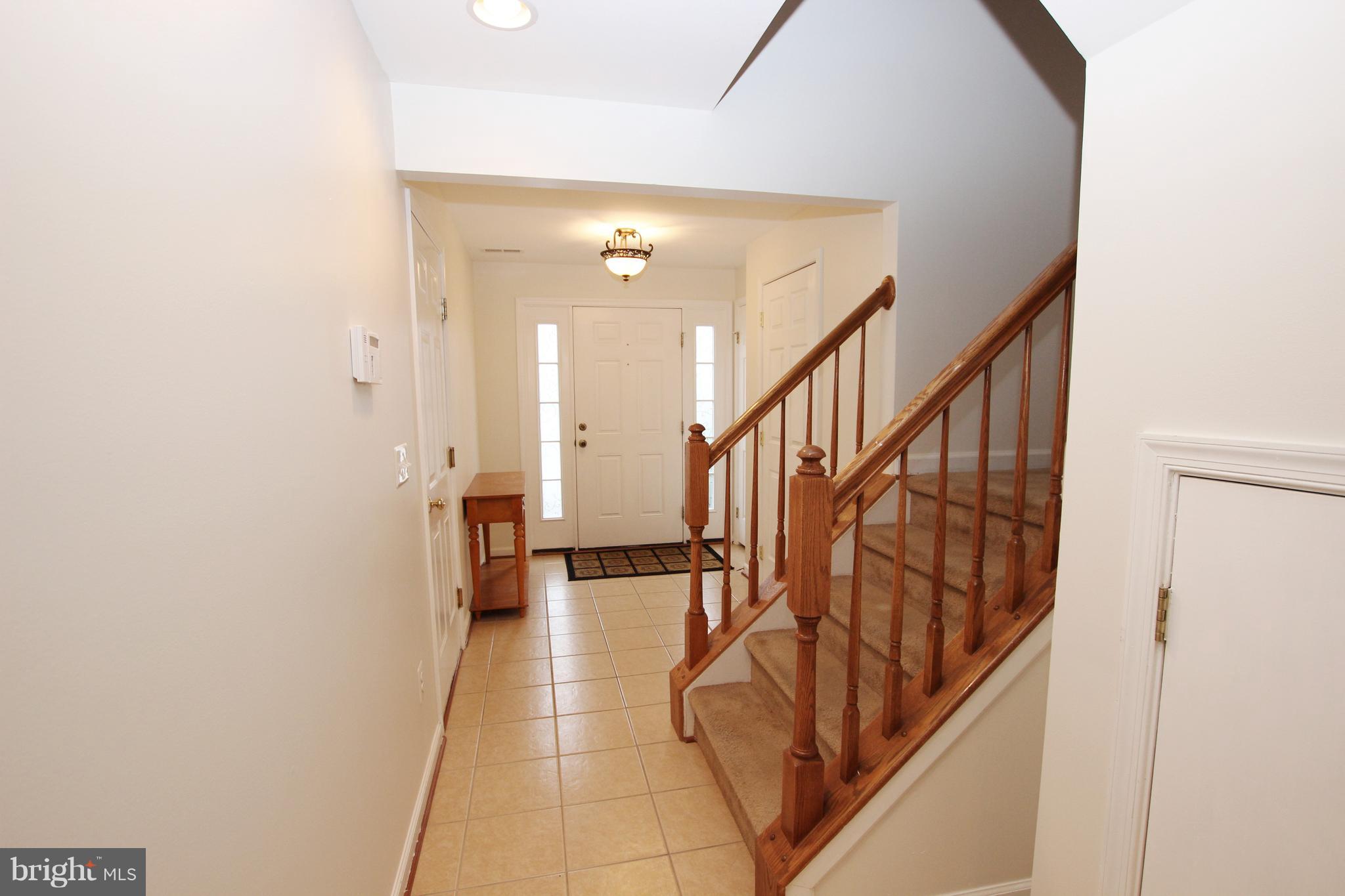 1315 Steed Street Ranson, WV 25438 - Photo 5 of 30 a view of entryway and hall with wooden floor