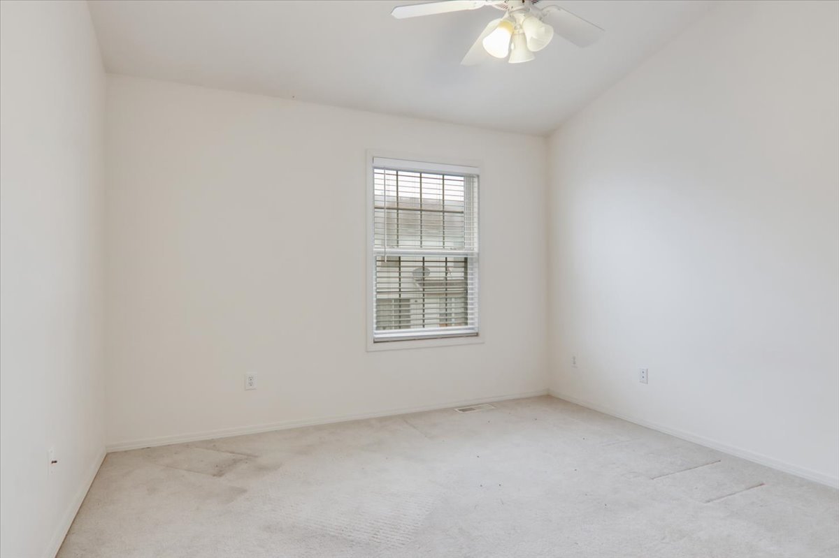 1204 Colonial Avenue Bloomington, IL 61701 - Photo 11 of 17 an empty room with a window