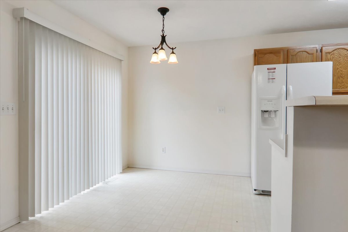 1204 Colonial Avenue Bloomington, IL 61701 - Photo 4 of 17 a view of empty room with ceiling fan