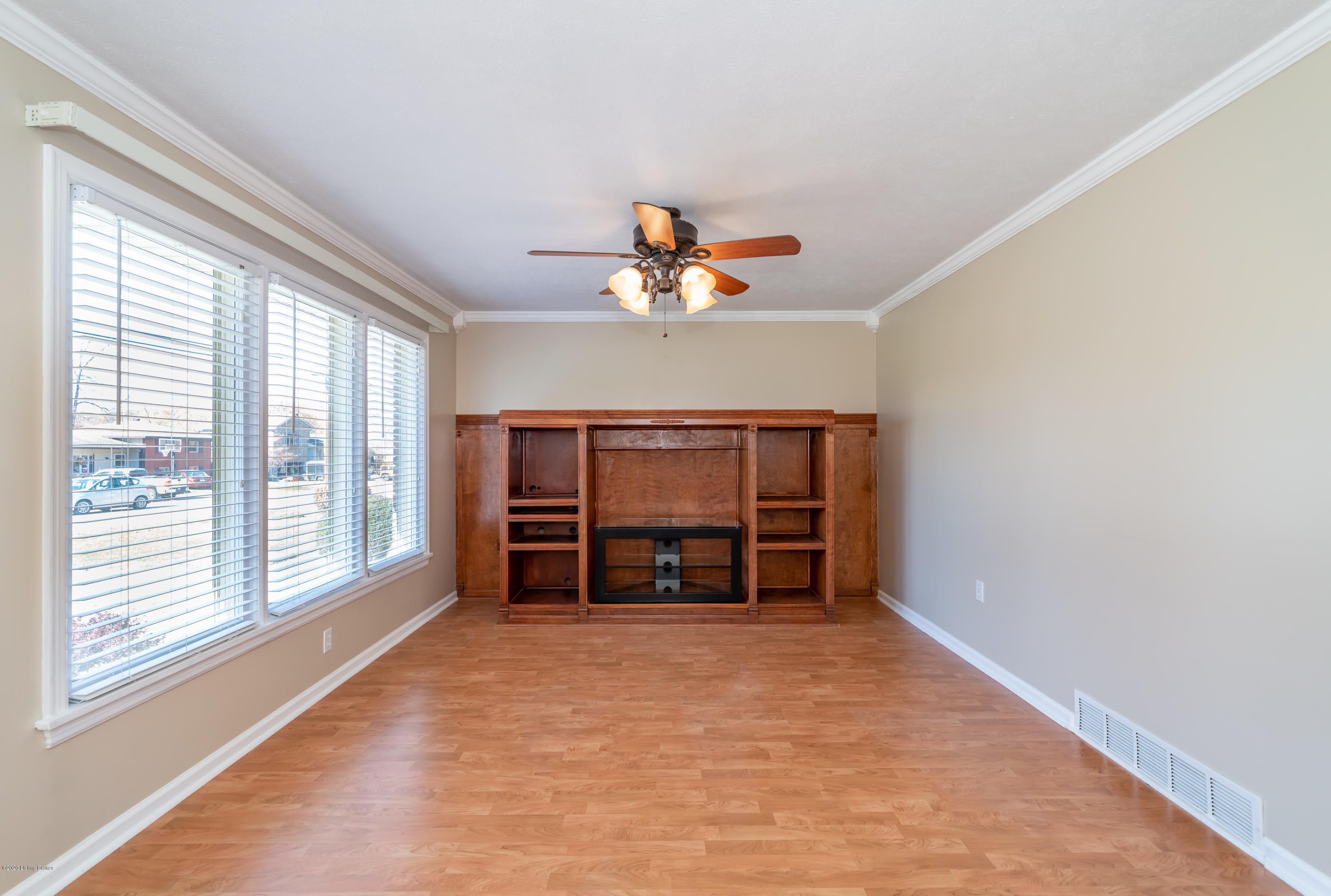 7309 Ridan Way Louisville, KY 40214 - Photo 22 of 37 Wood-burning fireplace behind built-in.