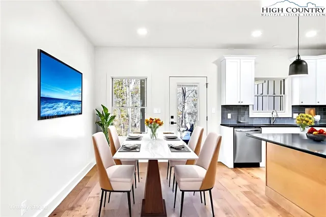 a view of outdoor space with wooden floor