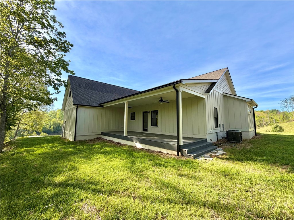 201 Whispering River Drive Crumpler, NC 28617 - Photo 21 of 48 a view of a backyard