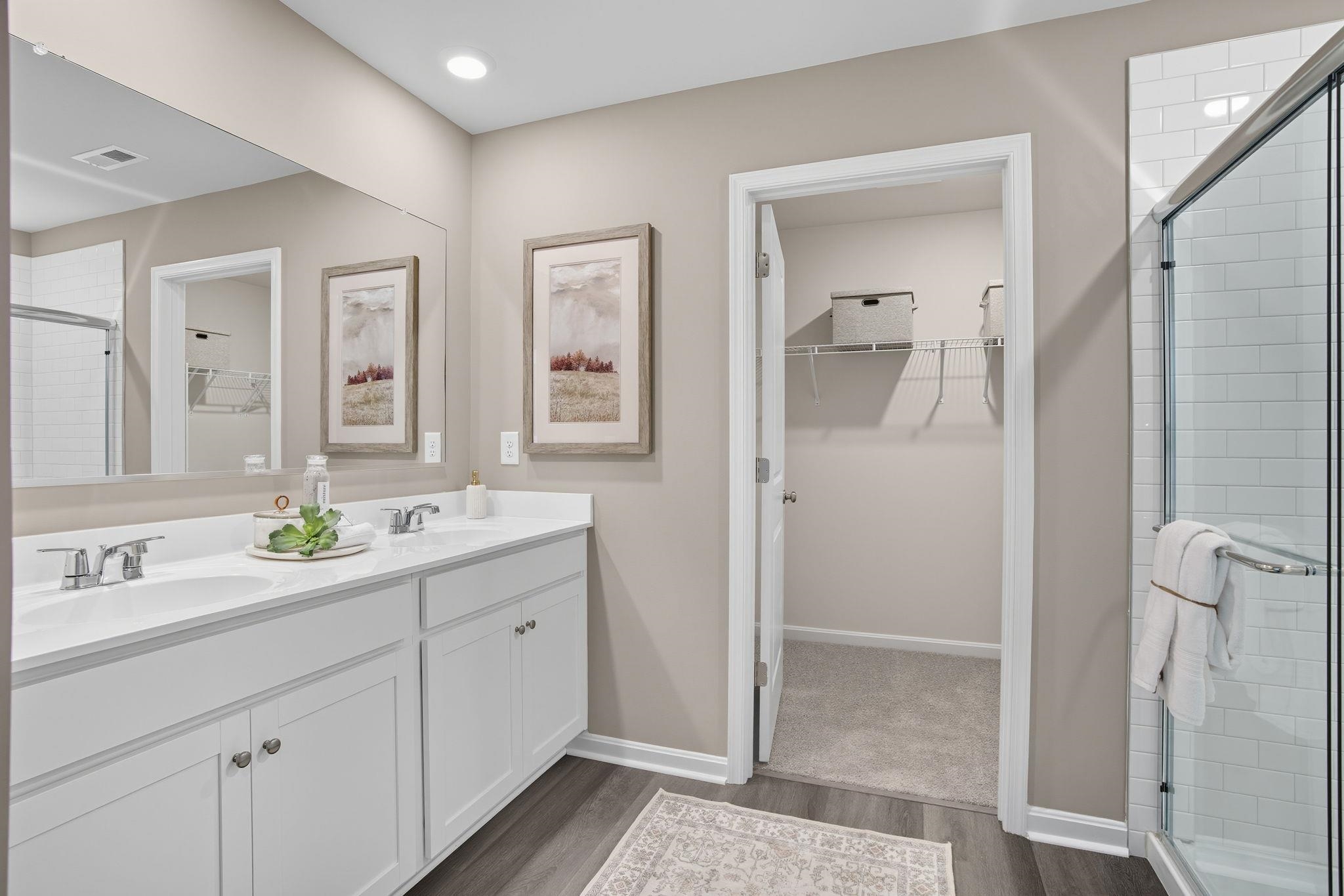 113 Meadow Ridge Way Staunton, VA 24401 - Photo 26 of 30 a bathroom with a double vanity sink mirror and shower