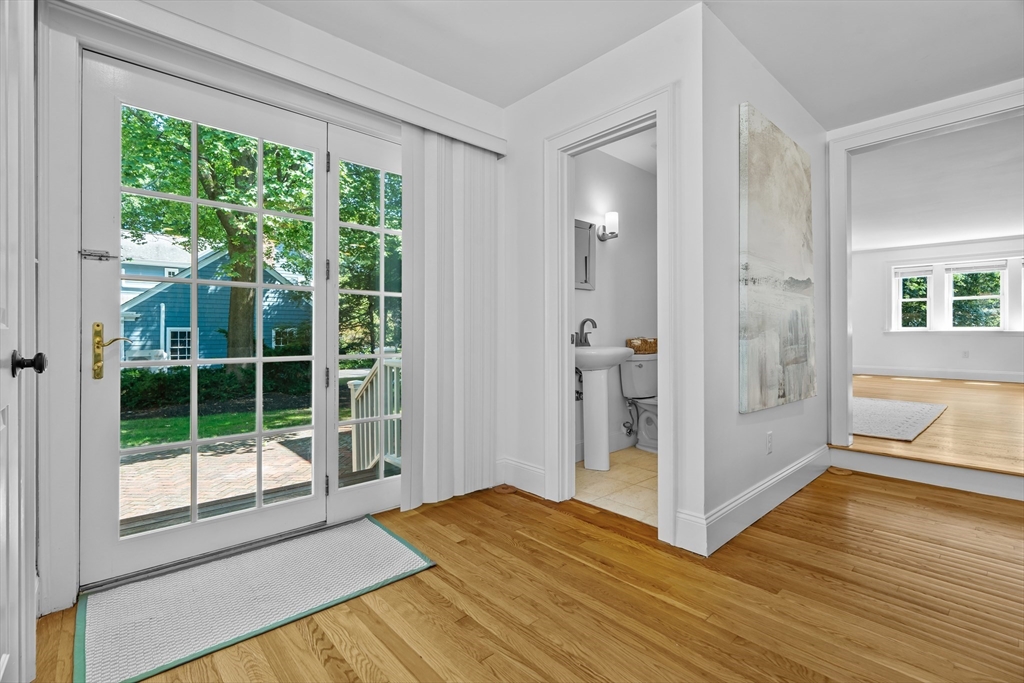 16 Vine Brook Road Lexington, MA 02421 - Photo 13 of 37 a view of a room with wooden floor and windows