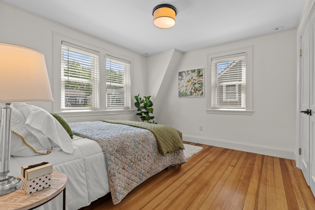 16 Vine Brook Road Lexington, MA 02421 - Photo 18 of 37 a spacious bedroom with a bed and a window