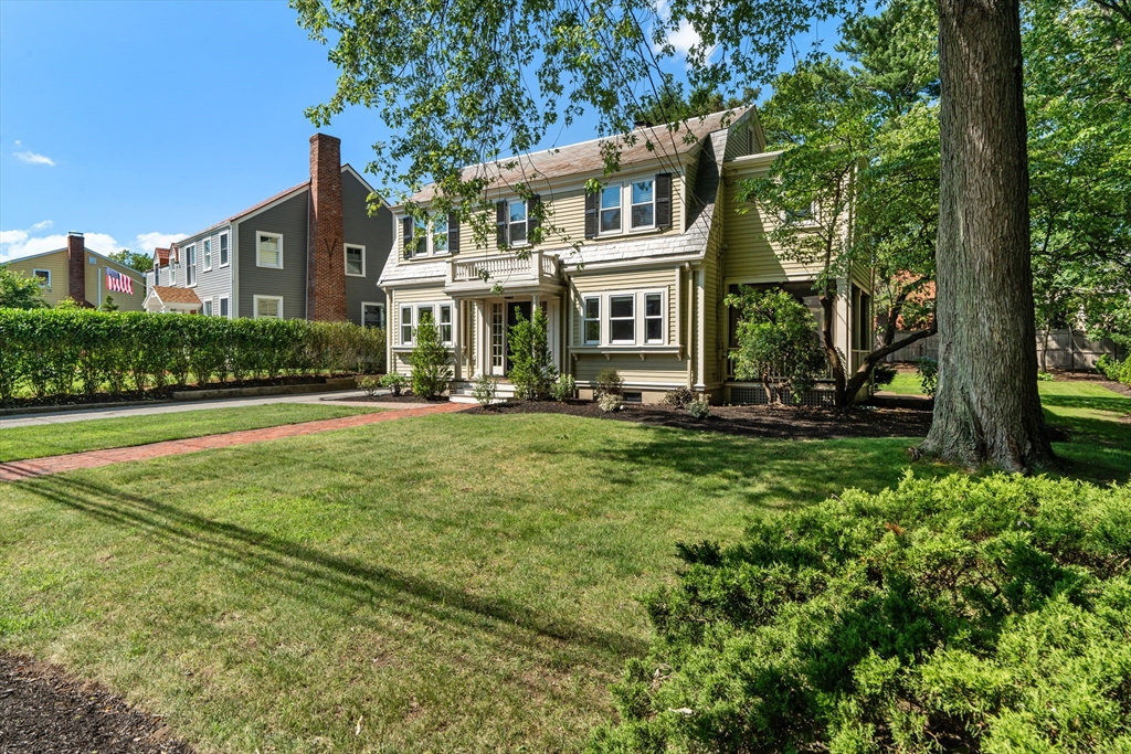 16 Vine Brook Road Lexington, MA 02421 - Photo 25 of 37 a front view of a house with a yard